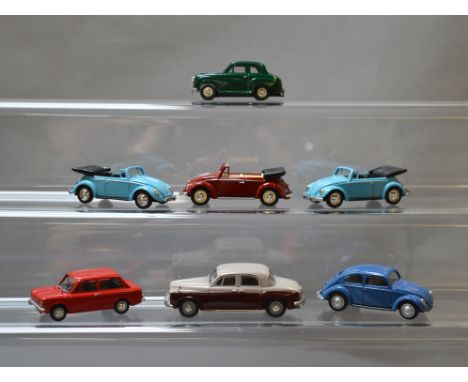 Six unboxed Lledo Vanguards pre-production resin car models, including Austin A35, Hillman, VW and Rover variants, all of the