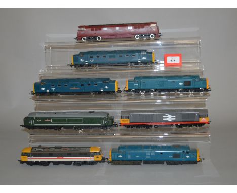 OO Gauge. Eight unboxed diesel and electric locomotives by Tri-ang, Lima, Hornby etc, including Hornby D1062 'Western Courier