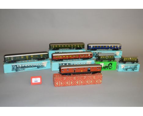 HO gauge. Seven Marklin coaches: 4040; 4000; 4032; 4044; 4023; 4024; 4021. G-VG, boxed. (7)