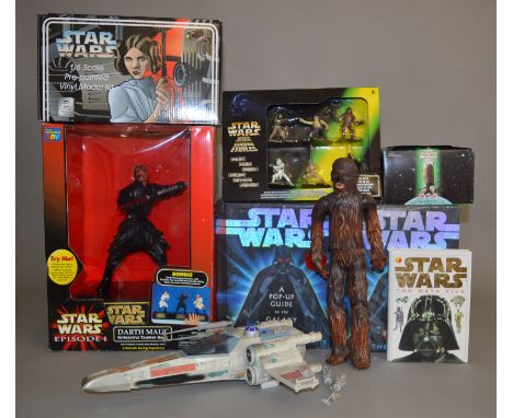 A mixed lot of Star Wars items: two A Pop-up Guide to the Galaxy books; Polydata Princess Leia 1:6 scale Pre-painted Vinyl Mo