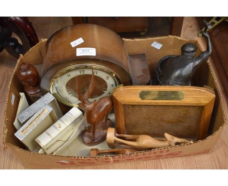 A circa 1950/60's 8 day mantle clock, resin figure of a barrel maker, treen animals and a prayer book