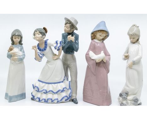Four Nao figures, three of young girls and one of Spanish girl and boy