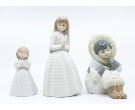 Three Nao figures, Holy Communion and eskimo