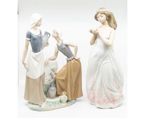 Two large Nao figures, ladies at the well and a lady with flowers