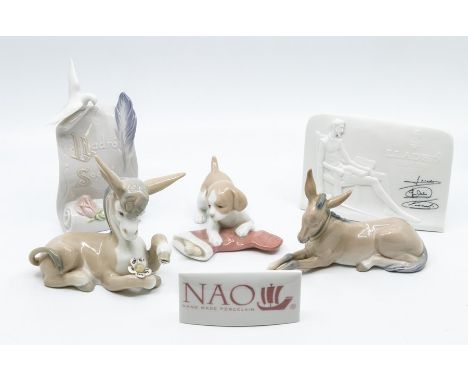 Four Lladro figures, donkeys and plaques, along with two Nao figures, dog and plaque