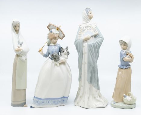 Three Nao figures of ladies with animals and a fan