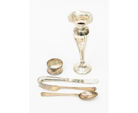 A collection of silver items to include: Victorian child's knife and fork, engraved by Josiah Williams & Co , London 1881; a 