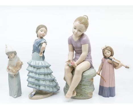 Two Lladro figures of girls along with two Nao figures of girls