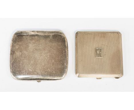 An Asprey & Co mirror compact case, engine turned decoration with applied initials MH within a rectangular border, diameter a