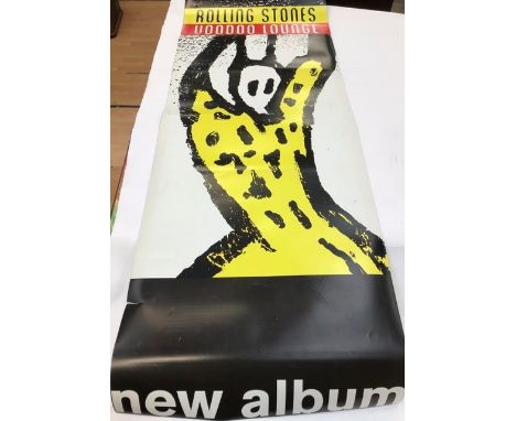 A collection of music memorabilia to include; Rolling Stones, Voodoo Lounge poster, The Best of 2001 Record Collector Magazin