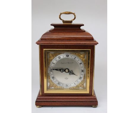 A 20th Century Elliott mantel clock by Mappin &amp; Webb Ltd, round silvered dial and chapter ring, black Roman numerals and 