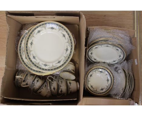 A Minton 'Grasmere' dinner service, comprising twelve dinner plates, eight cups, eight saucers, eight side plates, and eight 