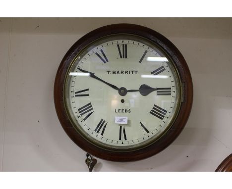 Pre WW2 British Air Ministry marked wall clock. White enamel dial with Roman numerals, marked "T Barritt, Leeds". Brass movem