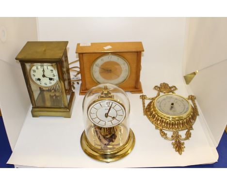 Three 20th Century mantle clocks, comprising Edwardian brass clock, 1960's electrical mantle clock and a 70's anniversary clo
