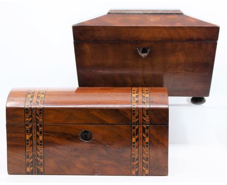A mahogany tea caddy, of sarcophagus form, early 19th century, veneered, minor loss, missing escutcheon; together with a rose