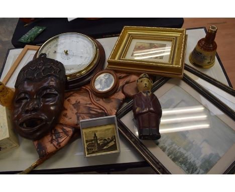 A collection of prints to include Spitfire subject, African art, wall barometer, a back scratcher, along with a collection of