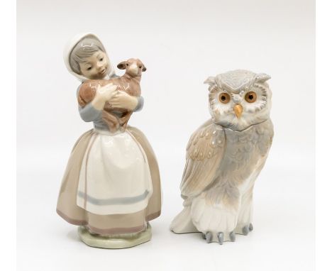 Two Nao figures including an owl and a young girl