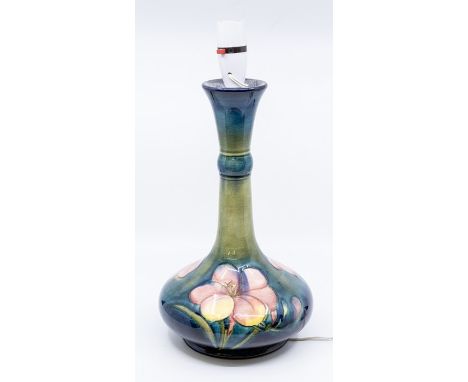 A late 20th Century Moorcroft table lamp, green ground, no shade included