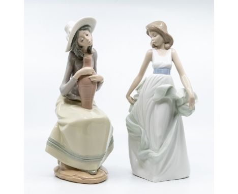 Two Nao figures of young ladies