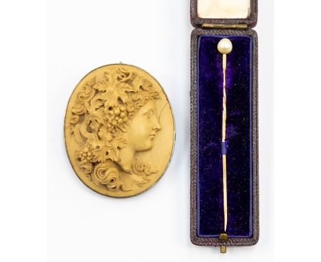 A pearl and 9ct gold stick pin, pearl approx 5mm, total gross weight approx 1.4gms, cased, along with a carved lava brooch, a