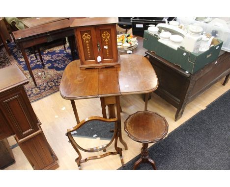 A collection of furniture, comprising Edwardian mahogany Sutherland table, an Edwardian mahogany smokers cabinet, a small mah