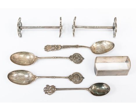A collection of silver items including spoons, knife rests and a napkin ring (Q)