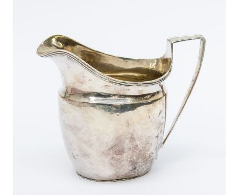 A George III silver helmet shaped cream jug, plain body with reeded rim, London, 1805 maker's mark possibly that of John Lias