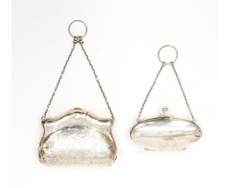 An early 20th Century silver cartouche shaped purse / bag, engraved with scrolling decoration and central monogram, on suspen