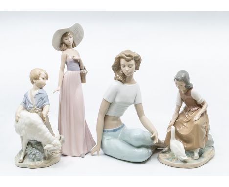 Four Nao figures of young ladies and boy with girl