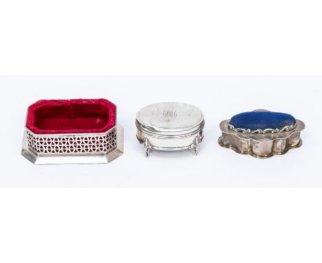 A group of three early 20th Century various silver ring boxes to include: a combination shaped oval ring and pin box, gilt in