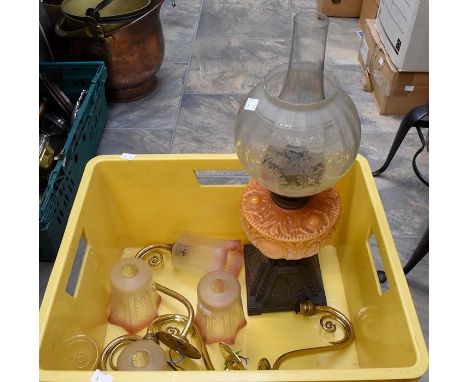 Victorian oil lamp, cast base, lava glass body with etch shade along with four brass wall lights with ruby glass shades
