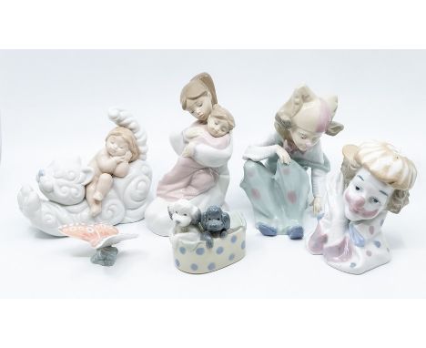 Six Nao figures, clowns, dogs, young children