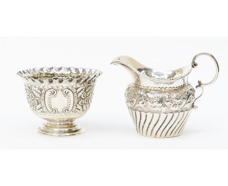 A Victorian silver sugar bowl, pinched wavy border above body profusely chased with scrolls, flowers and foliage, by John Wil