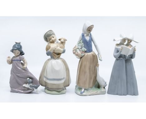 Three Nao figures with animals and another of two nuns
