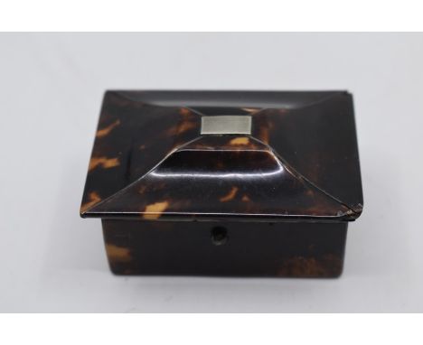 A 19th Century tortoiseshell small ring box and cover, domed cover inset with white metal cartouche