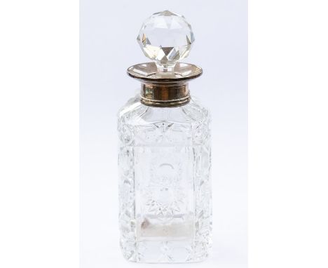 A silver and hobnail cut glass miniature spirit decanter, with silver collar (with later replacement stopper)&nbsp; London 19