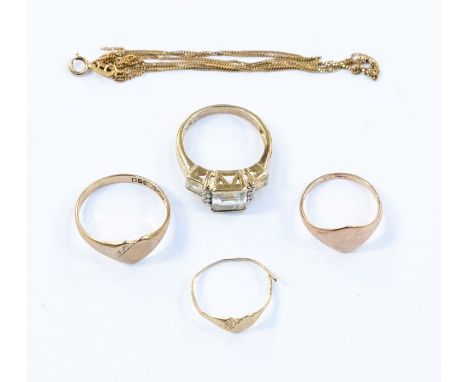 A collection of 9ct gold jewellery, including two 9ct gold signet rings, a yellow metal signet ring, a 9ct gold blue topaz dr