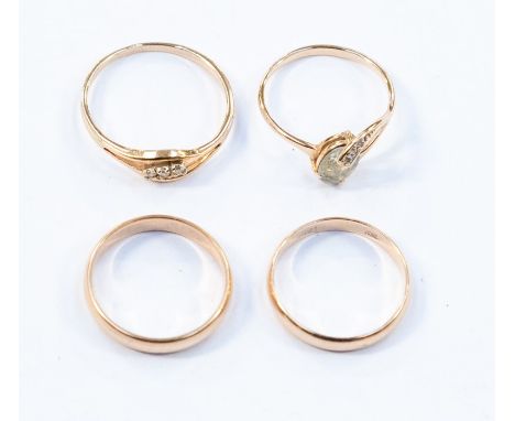 A collection of 14ct rose gold rings, to include an blue topaz and diamond set ring, set with an oval topaz with an diamond s