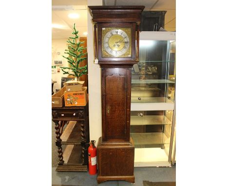 A George III oak 30 hour longcase clock, late 18th Century, maker is Thomas Noon, the hood with turned columns, glazed door e