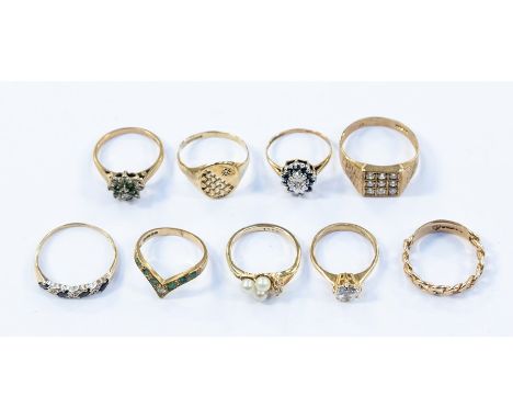 A collection of eight 9ct gold stone set dress rings to include an emerald and diamond cluster, sapphire and diamond cluster 