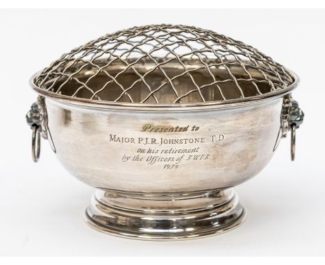 A modern silver circular rose bowl, ring handles with Lion's head terminals, with presentation inscription dated 1979, by W I