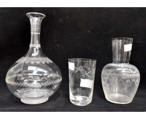 A mid Victorian wheel etched shaft and globe decanter, no stopper, a water with a waisted neck and a late 19th Century glass 