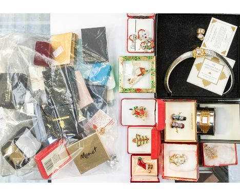 A collection of costume jewellery to include Christmas theme jewellery, paste set, enamel and metal brooches in the form of C