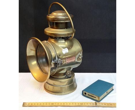 Lucas No746 'King of the road' paraffin car lantern together with Taylor Law & Co bank 