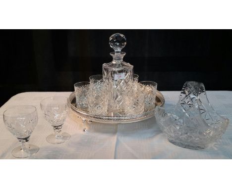 Crystal decanter with 6 matching glasses on silver plated serving tray, together with crystal basket & Stewart crystal glasse