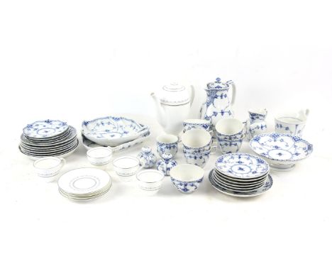 Royal Copenhagen Blue Onion pattern table wares, including tea cups and saucers, hot water pot, milk jug and various dishes, 