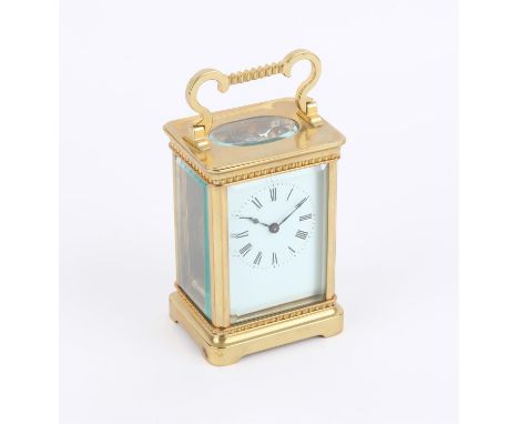 French brass carriage clock the white enamel dial with black Roman numerals, H15cm together with a selection of keys and wind