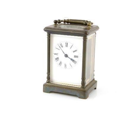 Early 20th century French brass and glass carriage clock with handle, white enamel dial, black painted Roman numerals  11cm h