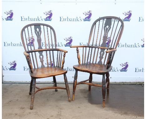 Two ash and elm Windsor armchairs, with hopped high backs, pierced splats, moulded seats and ring turned legs, one reduced in