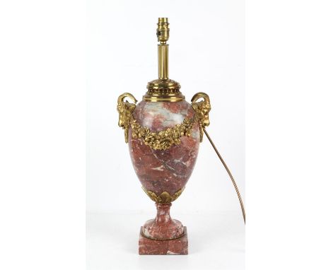 Red marble and ormolu mounted vase shape table lamp, in the French 19th century style, with ram's head and floral garlands on